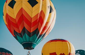 colored hot air ballons in the sky